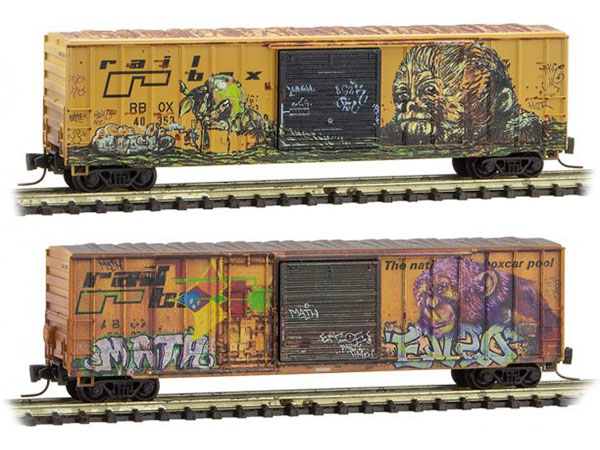 photos of two HO scale model railroad boxcars with weathering and graffiti added